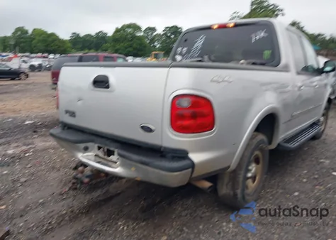 2002 Ford F-150 Lariat/Xlt z USA, uszkodzony, nr VIN 1FTRW08L62KC77375